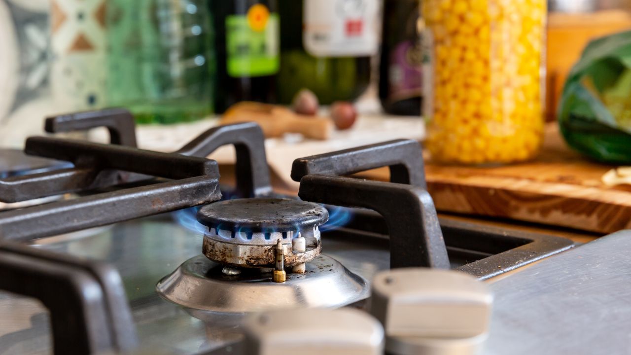 Every day grocery products and a gas kitchen cooker is seen in a household in Krakow, Poland as the European Commission is asking E.U. member states to adopt stricter energy consumption plans due to continuing war in Ukraine and possible further cuts in gas deliveries from Russia on July 20, 2022. The news comes as inflation in Europe reaches its decades high. (Photo by Dominika Zarzycka/NurPhoto via Getty Images)