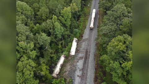 Two train cars with carbon dioxide came loose and rolled into the embankment at Brandon, Mississippi.