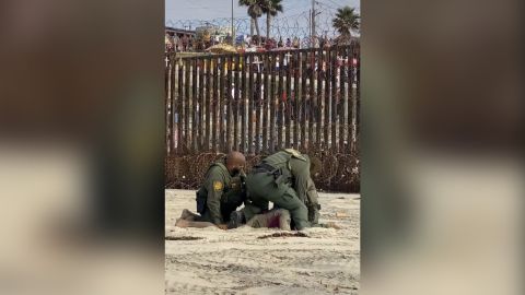 United States Border Patrol agents are seen during a confrontation with a migrant near Imperial Beach, California, in a video originally posted on TikTok.