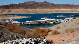 Boats are moored at the Callville Bay Marina behind an area once underwater on June 21, 2021, in the Lake Mead National Recreation Area, Nevada. 
