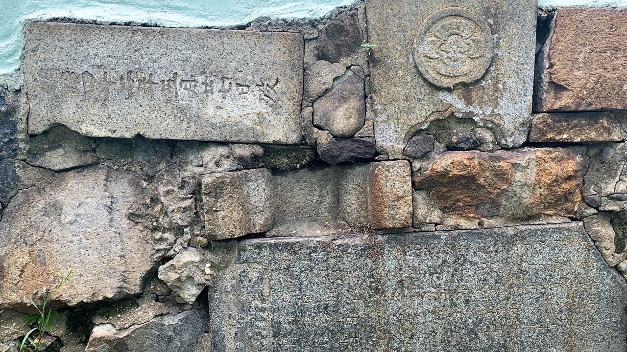 Many of the tombstones are engraved with the names, birthdays and dates of death of the Japanese deceased.