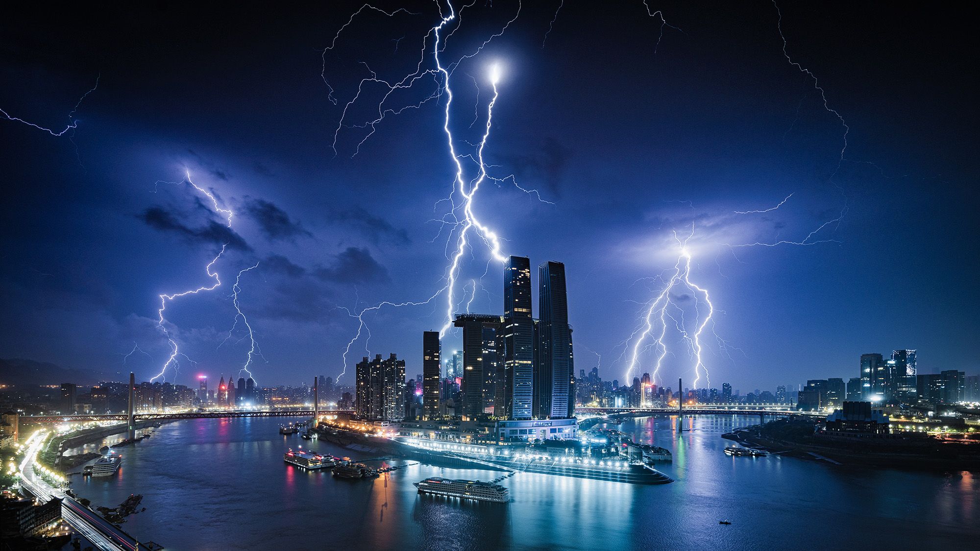 During the early hours of the night, Luo Xing captured this photo of lightning strikes over Chongqing, in China.