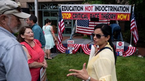 Efforts to ban the teaching of US history, such as this protest against the alleged teaching of critical race theory in schools, will weaken democracy, Liu says.