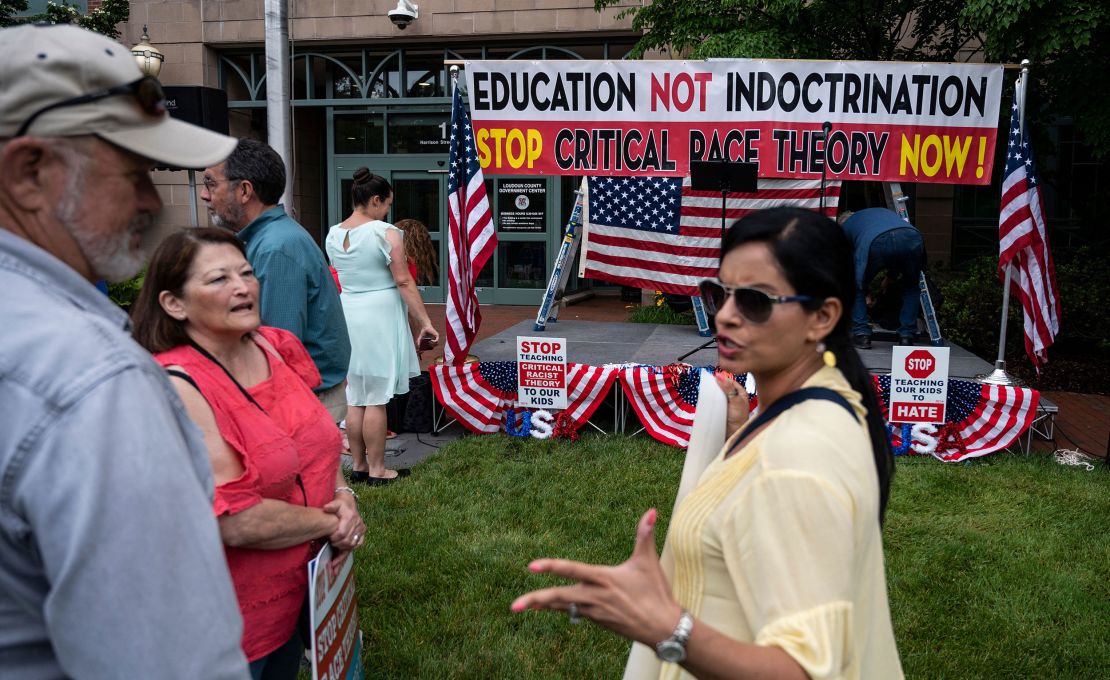 Efforts to ban the teaching of US history, such as this protest against the alleged teaching of critical race theory in schools, will weaken democracy, Liu says.