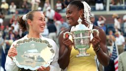 11 Sep 1999:  Serena Williams of the USA and Martina Hingis of Switzerland smile and pose with their trophies after their match in the US Open at the USTA National Tennis Center in Flushing Meadows, New York. Williams defeated Hingis 6-3, 7-6 (7-4). Mandatory Credit: Jamie Squire  /Allsport