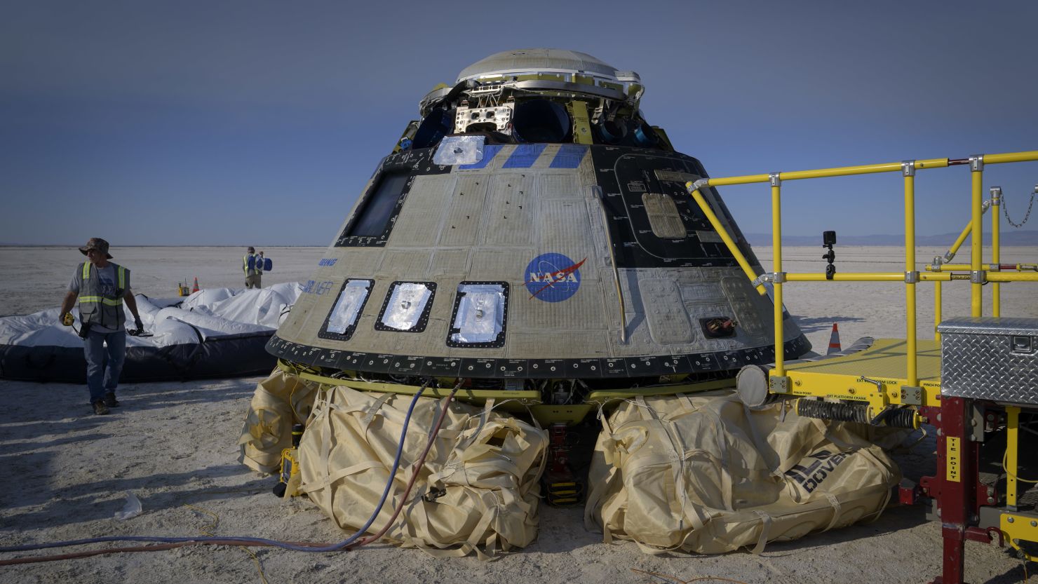 WHITE SANDS MISSILE RANGE, NM - MAY 25:  In this handout provided by the National Aeronautics and Space Administration (NASA), Boeing and NASA teams work around Boeings CST-100 Starliner spacecraft after it landed at White Sands Missile Ranges Space Harbor, on May 25, 2022 at the White Sands Missle Range, New Mexico. Boeing's Orbital Flight Test-2 (OFT-2) is Starliners second uncrewed flight test to the International Space Station as part of NASA's Commercial Crew Program. OFT-2 serves as an end-to-end test of the system's capabilities.  (Photo by Bill Ingalls/NASA via Getty Images)