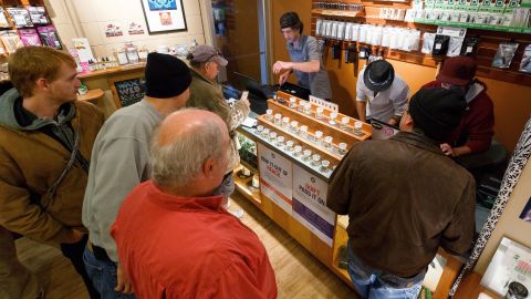 Employees help customers buy recreational marijuana at a Eugene, Oregon, pot dispensary in 2015. 