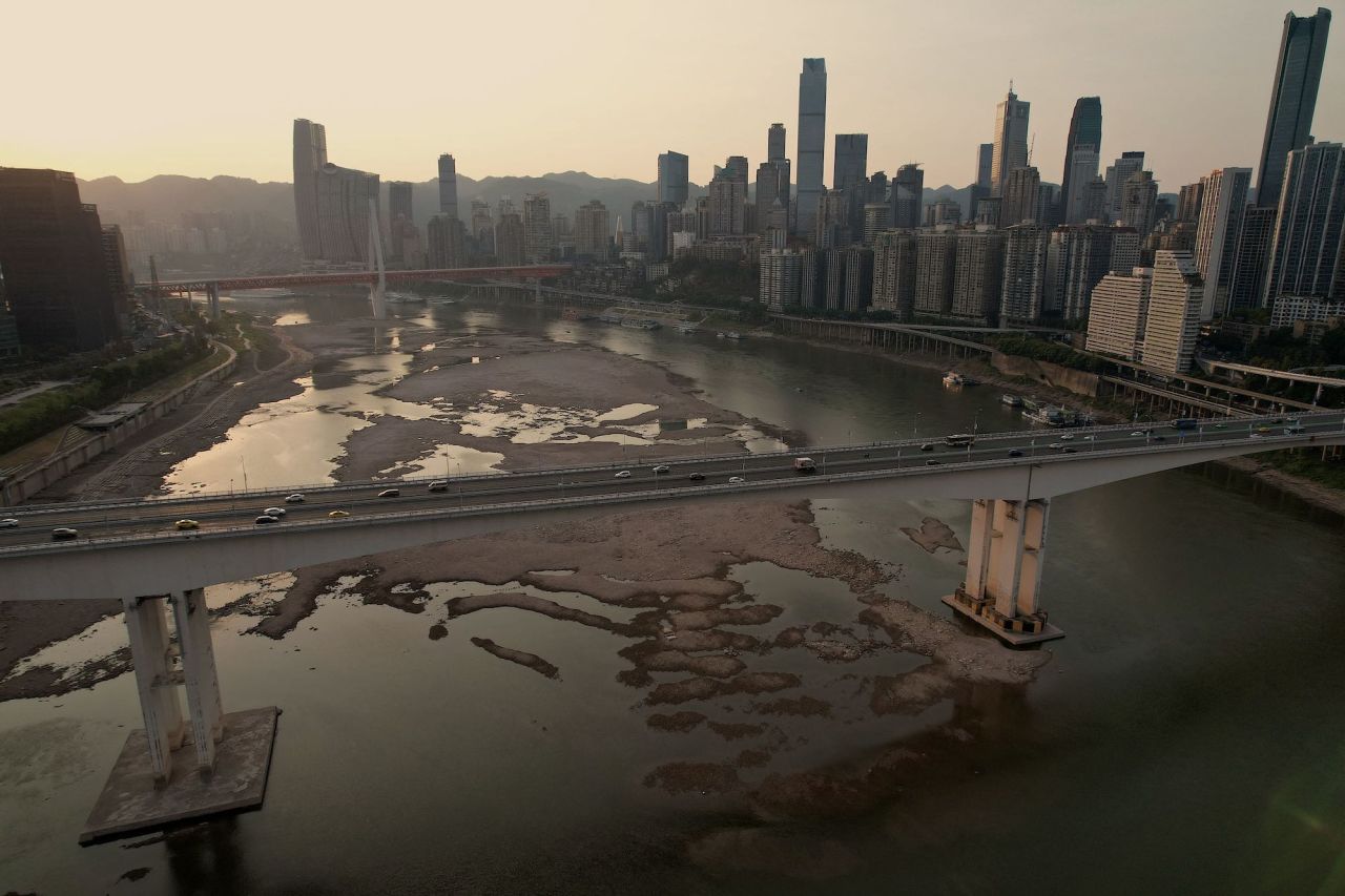 Sections of a dried riverbed are exposed in the Jialing River, a tributary of the Yangtze River, in Chongqing, China, on Thursday, August 25. A painful lack of rain and relentless heat waves are <a href="https://www.cnn.com/2022/08/20/world/rivers-lakes-drying-up-drought-climate-cmd-intl/index.html" target="_blank">drying up rivers</a> in the US, Europe, Asia and the Middle East.