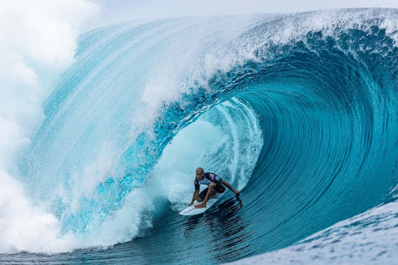 US surfer Kelly Slater competes during the Outerknown Tahiti Pro in Teahupo'o, French Polynesia, on Thursday, August 18.