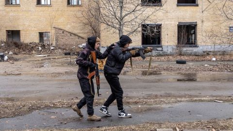 Civilians take part in a military training course conducted by a Christian Territorial Defence Unit on February 19, 2022 in Kyiv, Ukraine. 