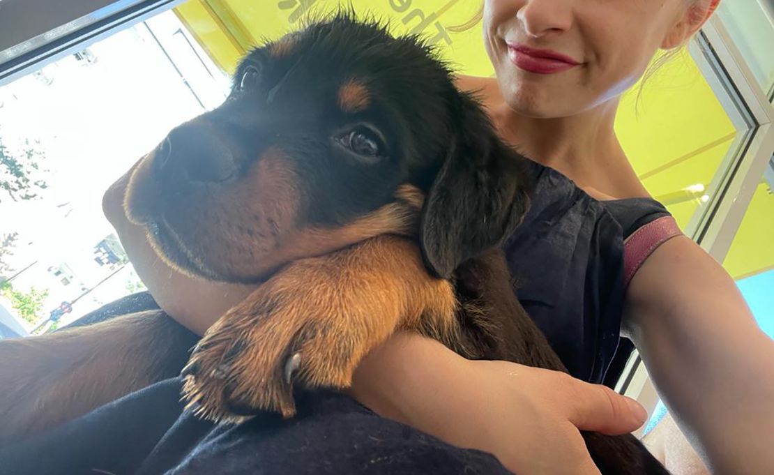 Holly and her dog at the vet. 