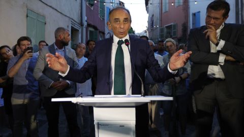 Far-right pundit and politician Eric Zemmour, center, delivers a speech following the first round of voting in France's parliamentary elections, in Cogolin, on June 12, 2022.