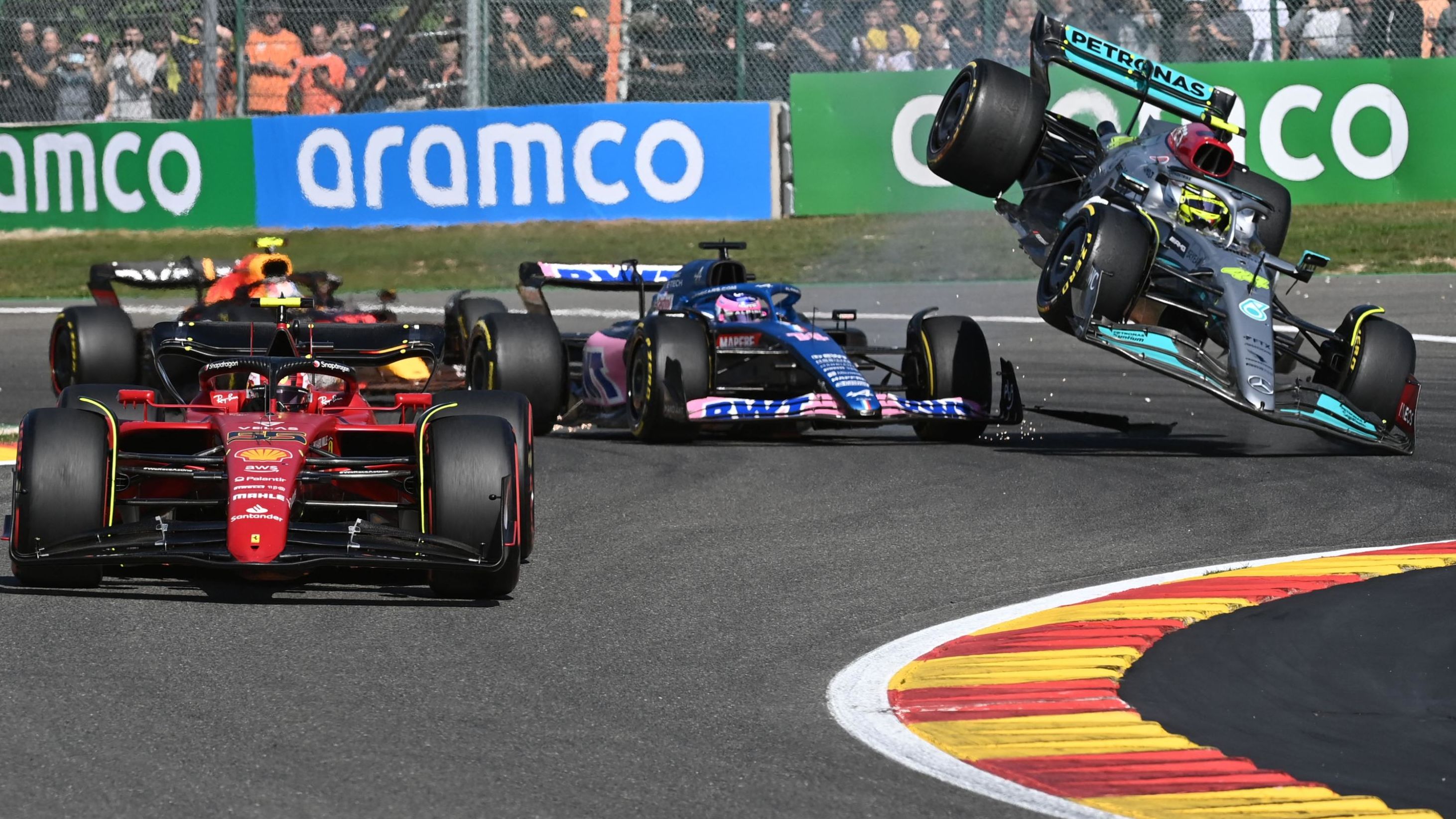 Hamilton collides with Fernando Alonso. 