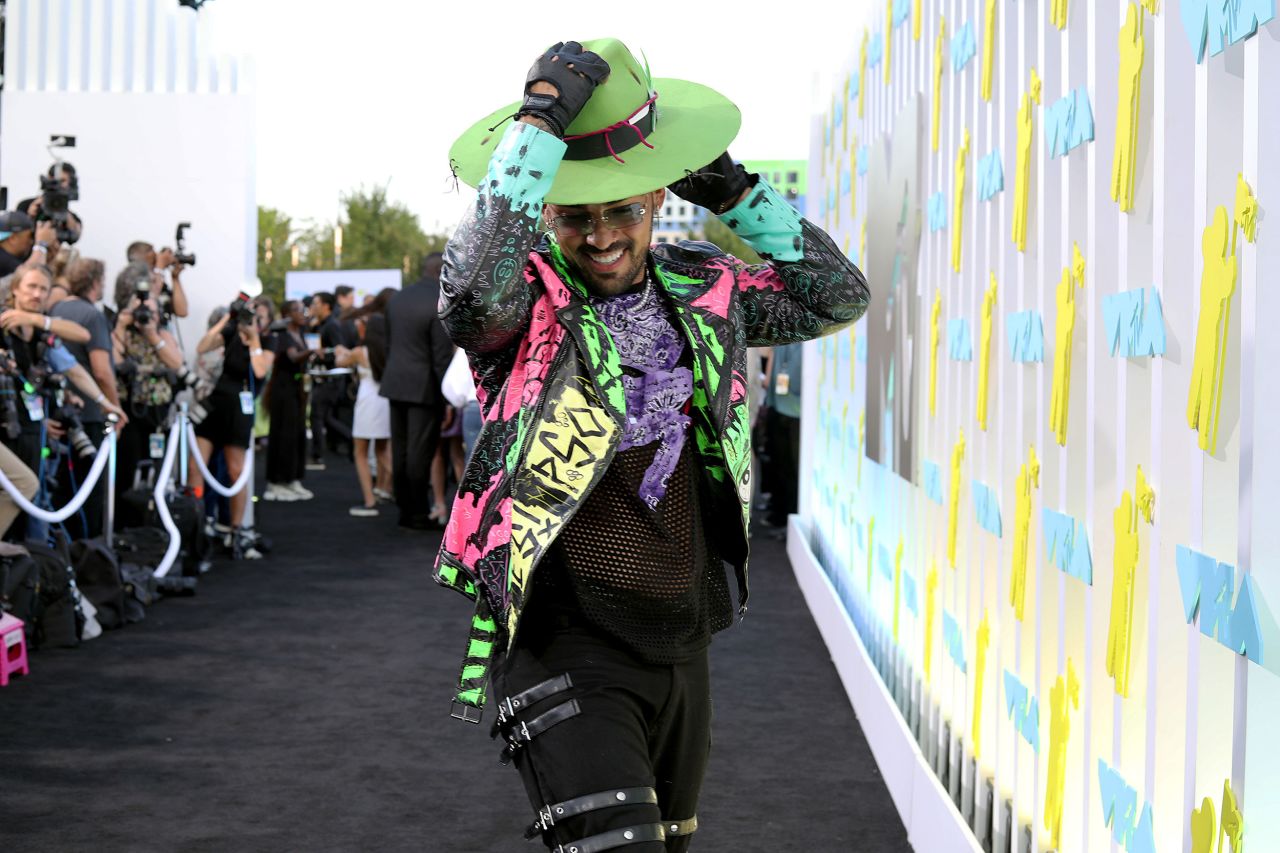 All eyes were on singer Samy Hawk in his graffiti-inspired leather jacket and bright green hat.