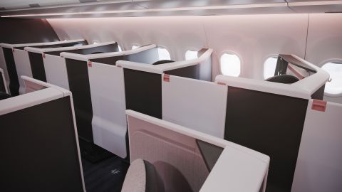 Business class doors help passengers avoid "brush past" bumps from people walking down the aisle.