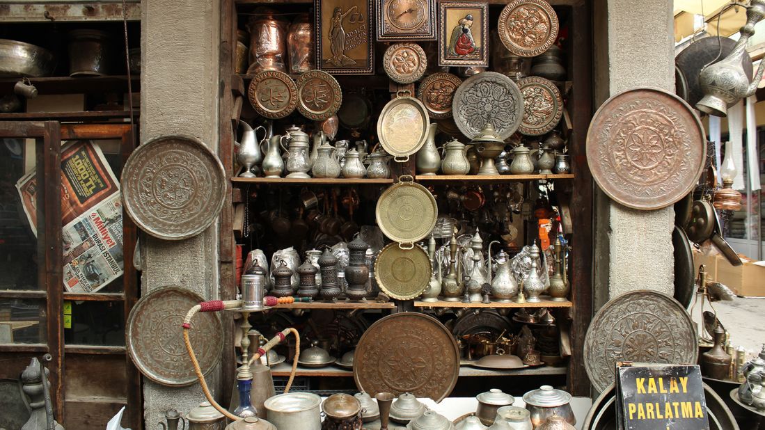 <strong>Trad</strong><strong>ing places: </strong>A copper shop in Kemeraltı sells traditional wares. The bazaar is made up of interconnected covered streets.