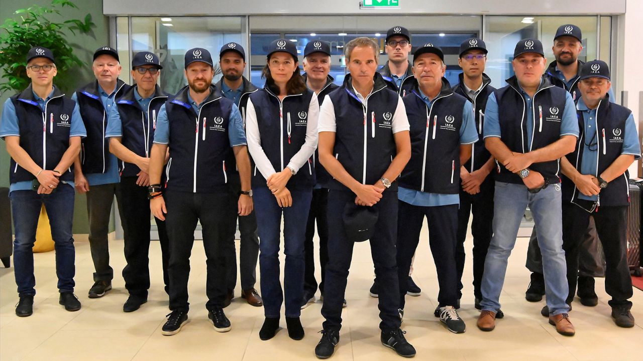 IAEA Director-General Rafael Mariano Grossi (center), leads the UN watchdog's mission as it begins the official visit to Zaporizhzhia,at Vienna International Airport on August 29.