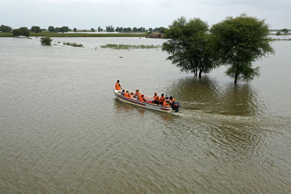 Rescue workers carry out an evacuation operation for stranded people in Rajanpur on August 25.