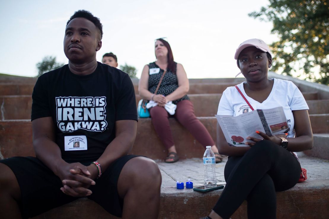 Chris Munga and his wife, Gyoice Abatey, attend a vigil for his missing sister  in Gillette, Wyoming. The couple makes the 12-hour drive from their home in Meridian, Idaho, to take part in local searches. 