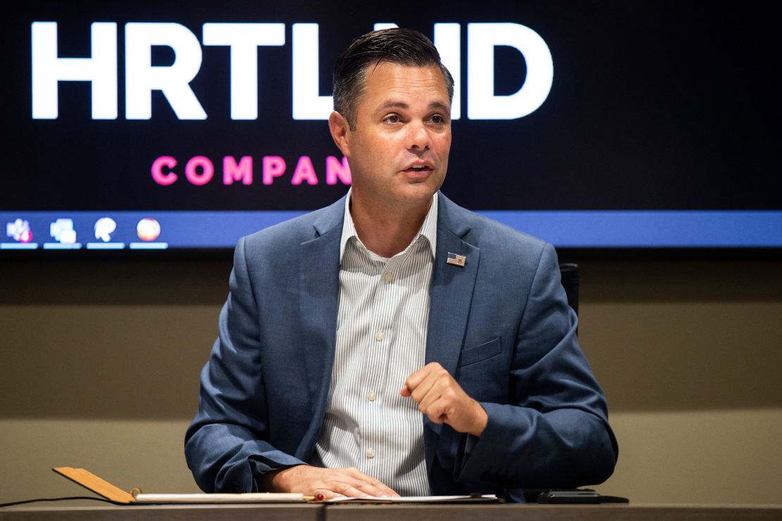 Republican state Sen. Zach Nunn, seen here at a business roundtable earlier this month, is challenging Democratic Rep. Cindy Axne.  