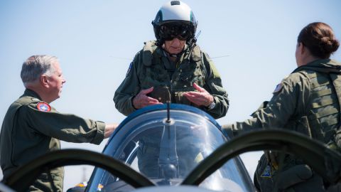 Dean "Diz" Laird, center, stands in the rear seat of a T-34C Turbomentor with the "Flying Eagles" of Strike Fighter Squadron (VFA) 122 in Coronado, California, on July 9, 2019.