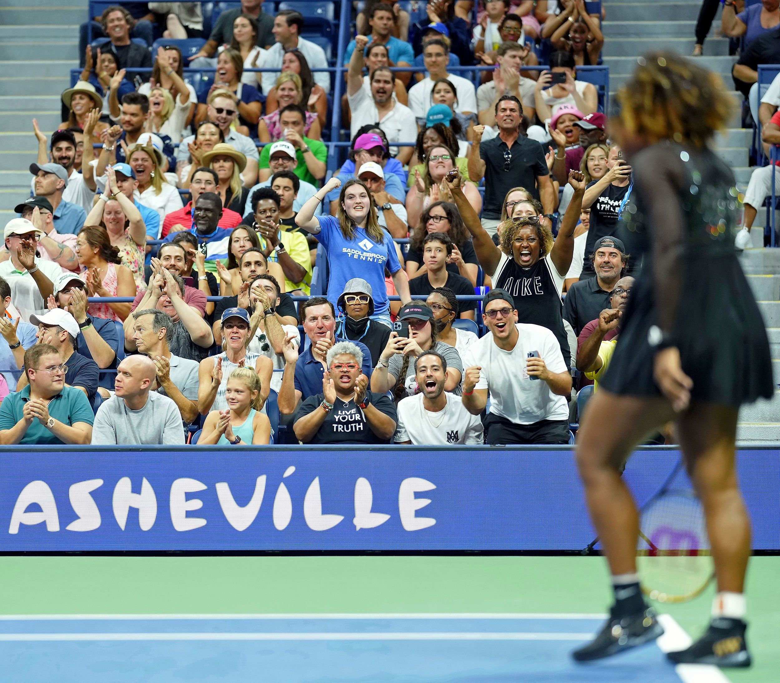 Fans cheer for Williams during Monday's match.