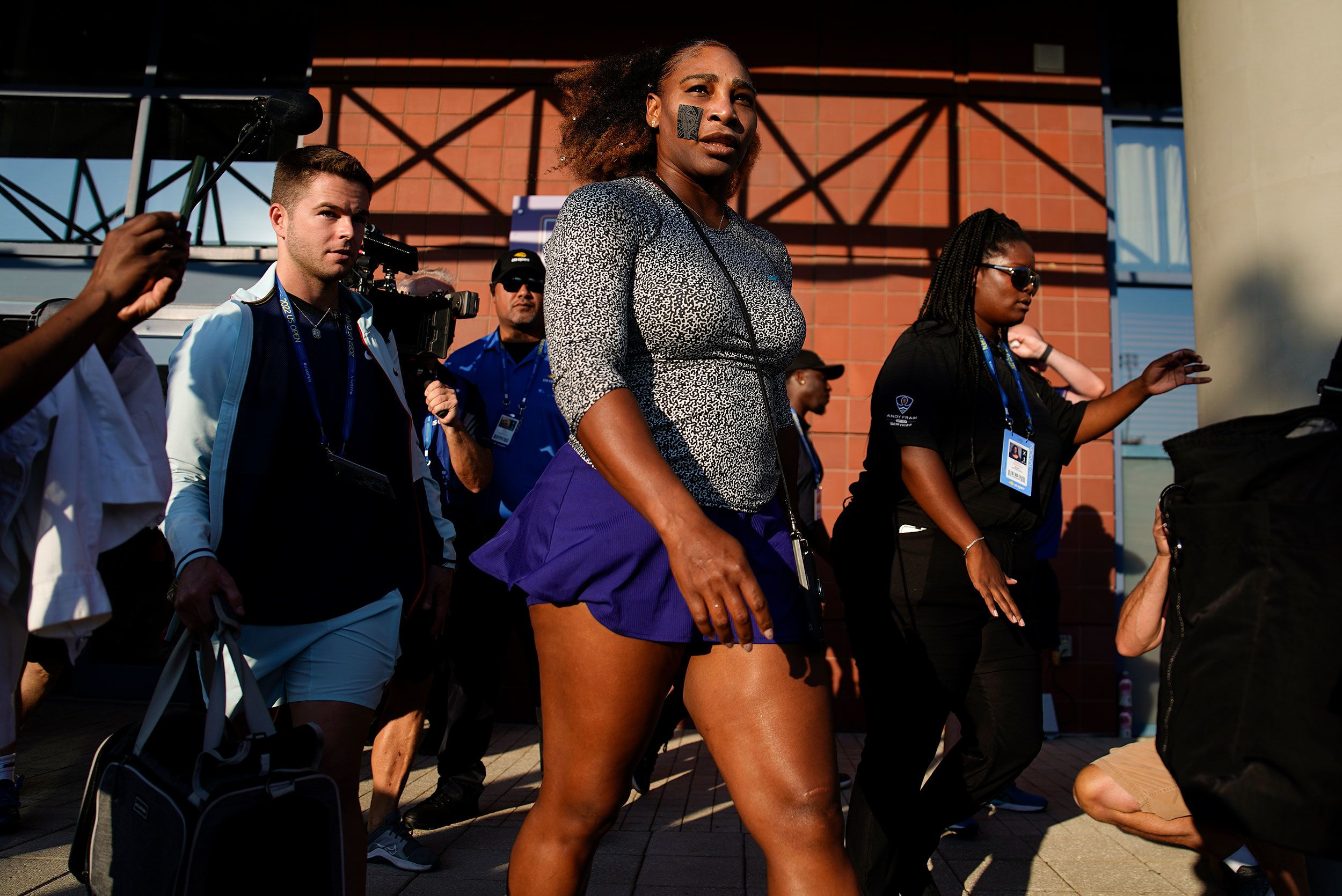 Williams walks to the practice court before her match on Monday.