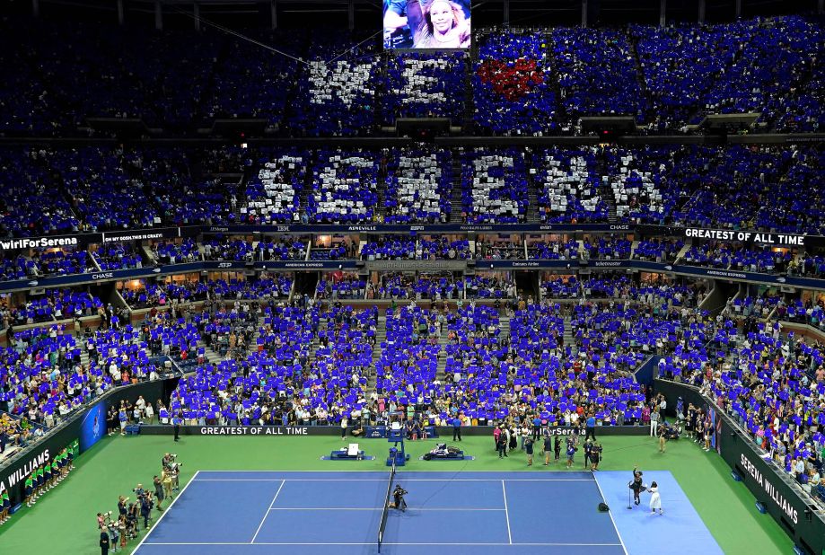 Fans at Arthur Ashe Stadium show their love for Williams after Monday's opening win over Danka Kovinic.