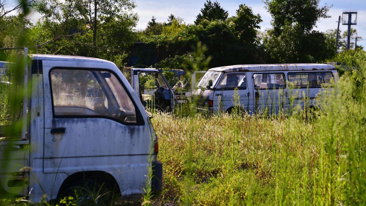 Abandoned cars in Futaba, Fukshima prefecture on August 29, 2022.