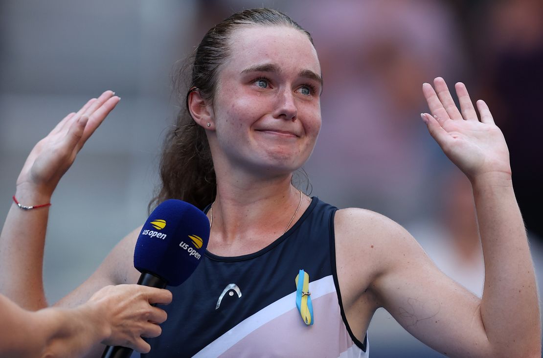 Snigur reacts after defeating Halep at the US Open.