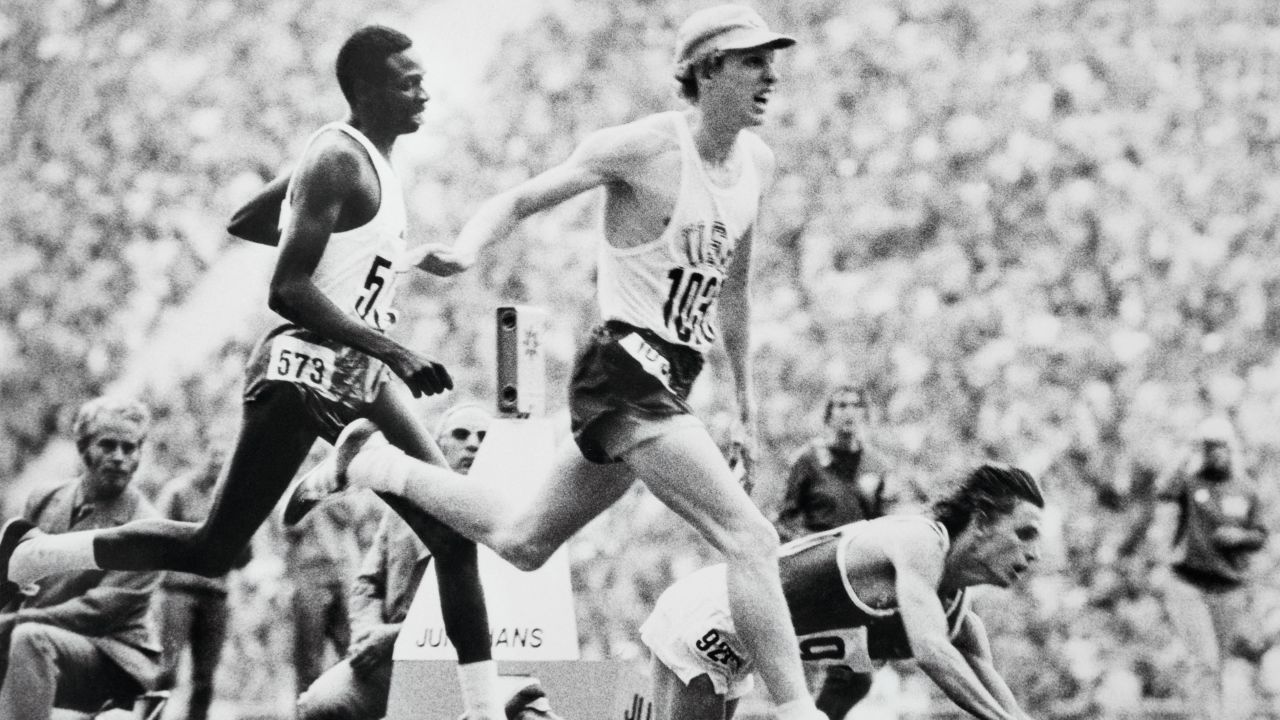 Wottle's (center) time of 1:45.86 saw him finish just 0.03 seconds ahead of Arzhanov (right).