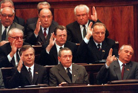 Gorbachev, bottom right, and members of the Politburo vote to remove Andrei Gromyko, bottom center, as Chairman of the Presidium of the Supreme Soviet in October 1988. Gorbachev would then succeed him in the role.