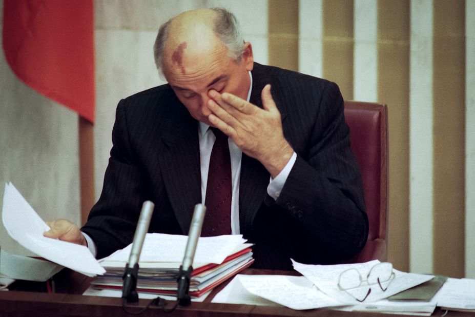 Gorbachev rubs his eyes while speaking in Moscow in August 1991. He threatened to resign if the Soviet Union fell apart. That month, hard-liners in his country staged a revolt while Gorbachev was on vacation in the Crimea. Boris Yeltsin, the president of the biggest Soviet republic and a fierce critic of what he considered Gorbachev's halfway reforms, came to Gorbachev's rescue, facing down and defeating the coup plotters.