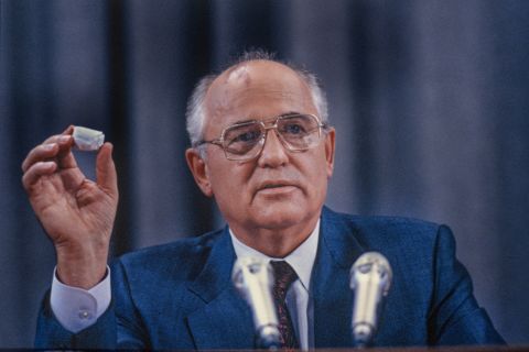 Gorbachev held a news conference the day after he returned from Crimea in August 1991. He had been held captive in his dacha by coup plotters attempting to remove him from power in order to stop his economic reform policies. The coup leaders had stated publicly that Gorbachev was stepping down due to ill health. Here, Gorbachev holds a crumpled note that he had hidden on his body to explain what really happened in case he was killed.