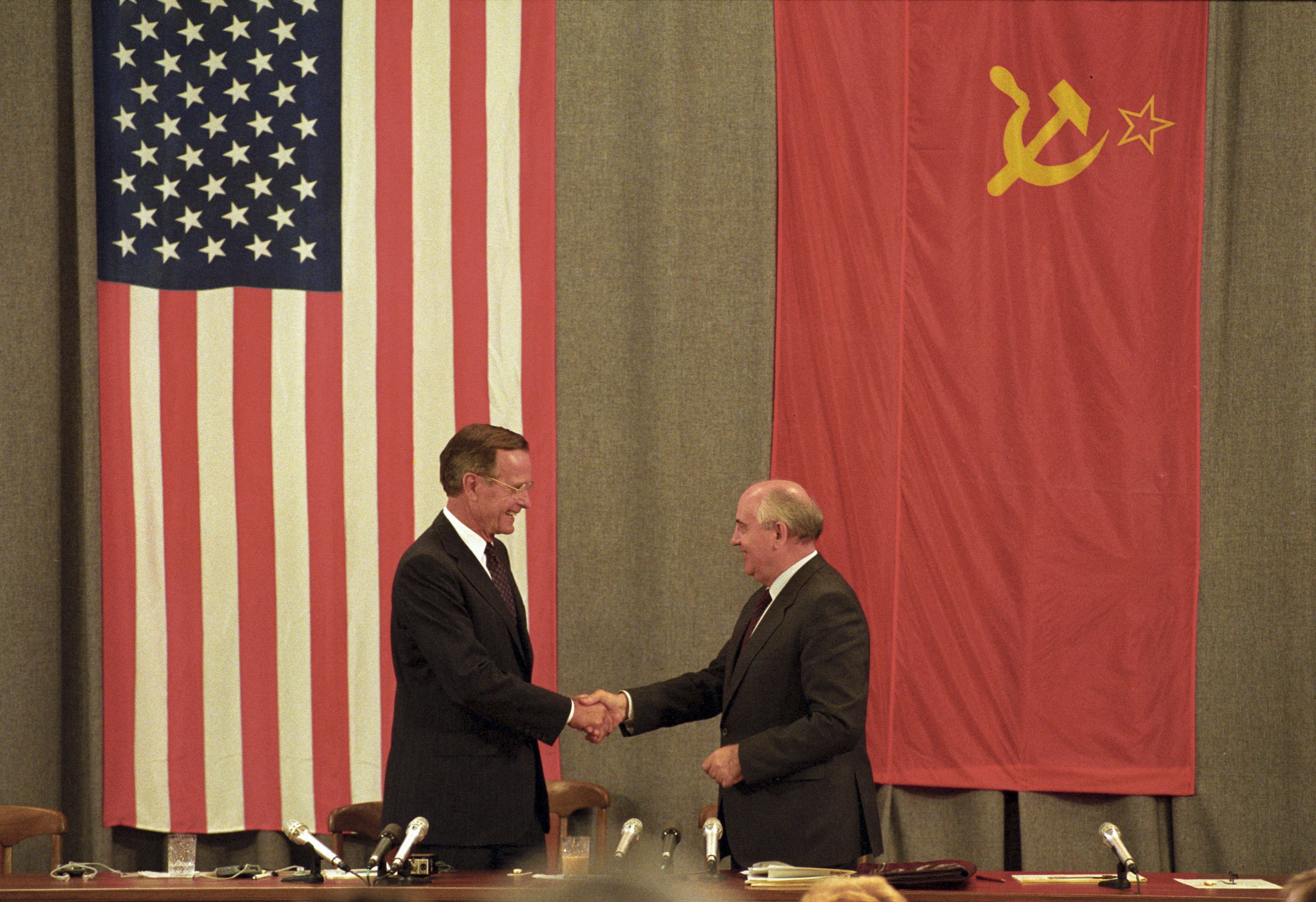 Gorbachev shakes hands with Bush in Moscow in July 1991.