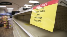 Signs limit water purchases at a Kroger in Jackson, Mississippi, on August 30, 2022.