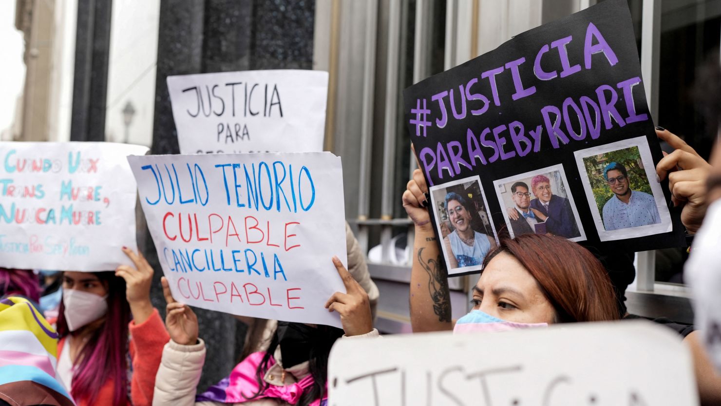 Demonstrators in Lima, Peru, hold signs demanding justice for Harvard graduate and transgender rights activist Rodrigo Ventosilla, who died on the island of Bali.