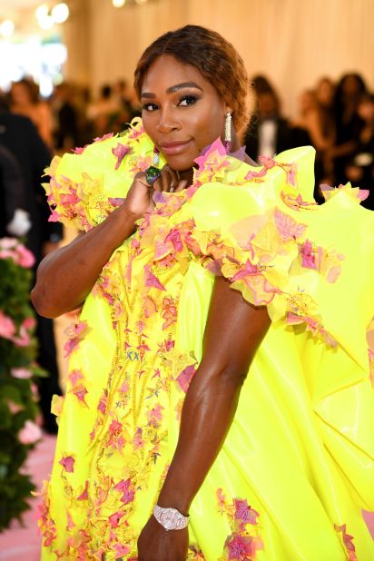 At the Met Gala in 2019, Williams stepped out in a eye-catching yellow and pink Versace dress and matching Off-White X Nike trainers. 