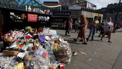 Rubbish overflows from bins during a workers' strike in Edinburgh, Scotland on August 27.