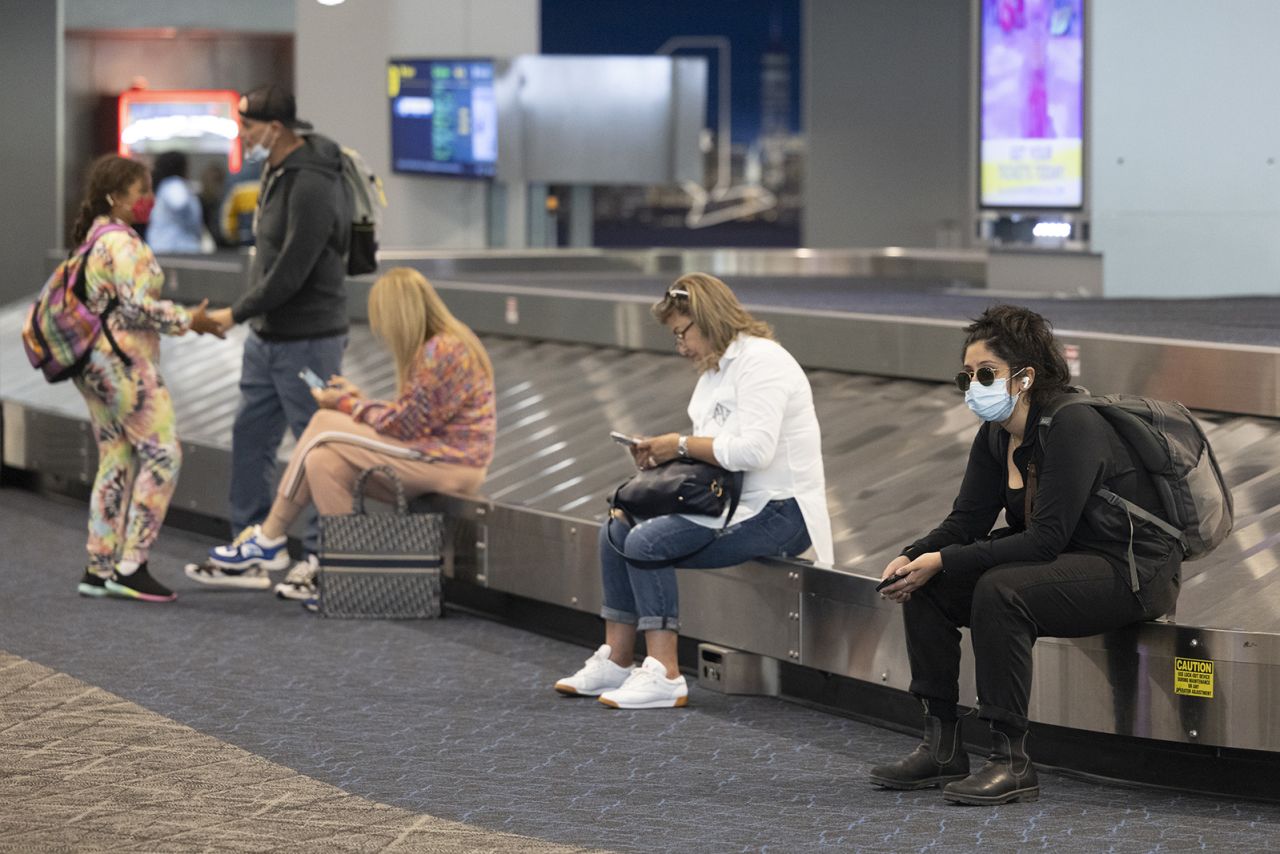 Travelers wait at LaGuardia Airport in the Queens borough of New York on July 1, 2022.