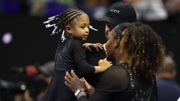 Serena Williams of the United States is greeted by her daughter Alexis Olympia Ohanian Jr. following her victory against Danka Kovinic of Montenegro during the Women's Singles First Round on Day One of the 2022 US Open at USTA Billie Jean King National Tennis Center on August 29, 2022 in the Flushing neighborhood of the Queens borough of New York City. 
