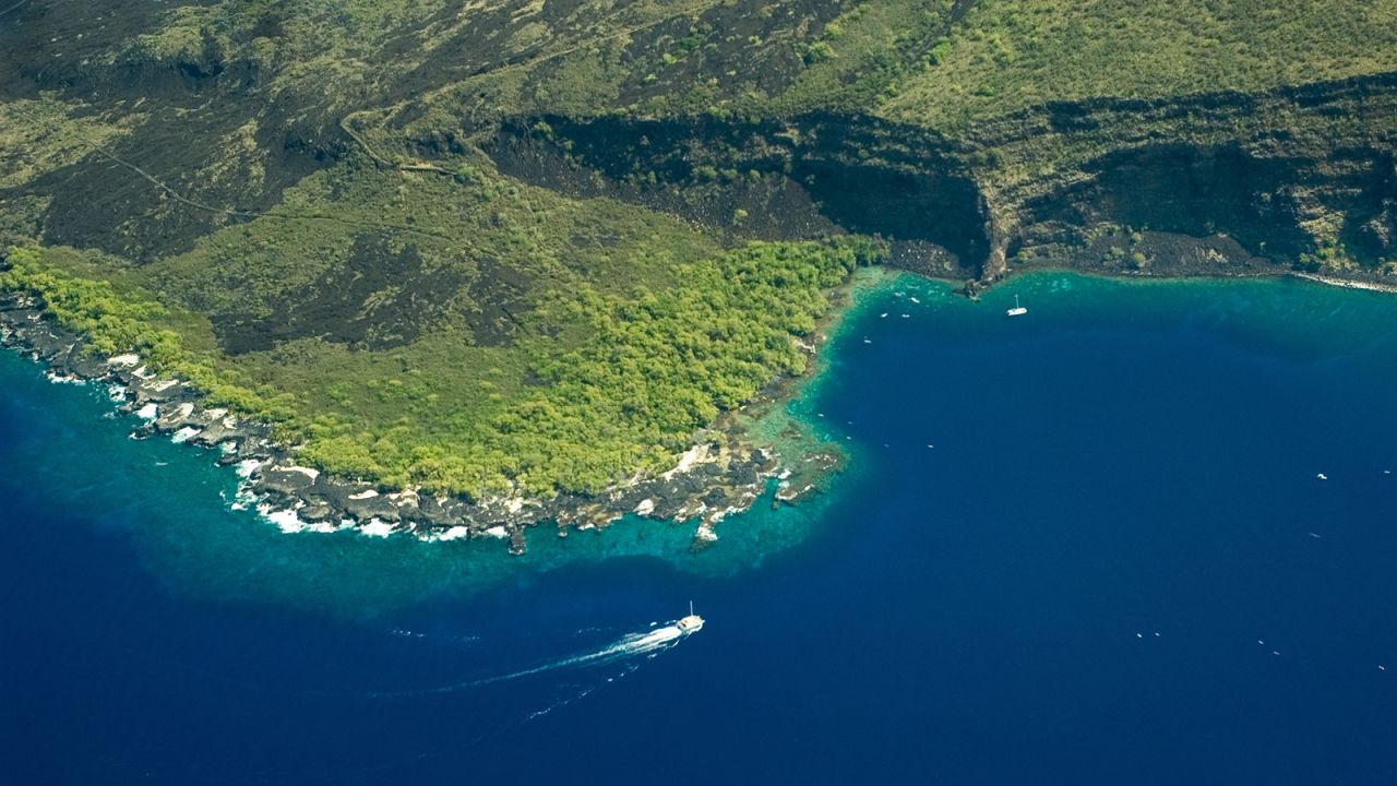 Kealakekua Bay offers awesome kayaking, snorkeling and Hawaiian history on the island of Hawaii.