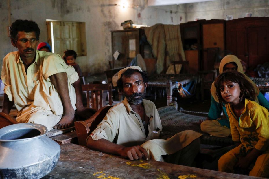 Displaced people take refuge in a school in Jacobabad, Pakistan, on August 30.