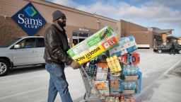 A shopper stocks up on merchandise at a Sam's Club store on January 12, 2018 in Streamwood, Illinois. 