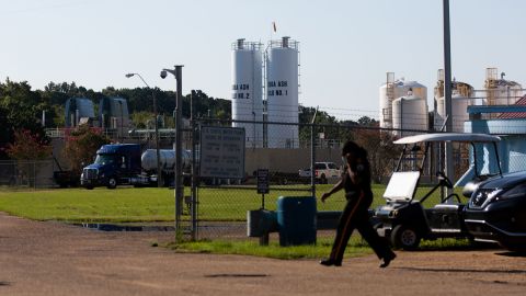 A security guard is seen outside of O.B. Curtis Water Plant on August 31.