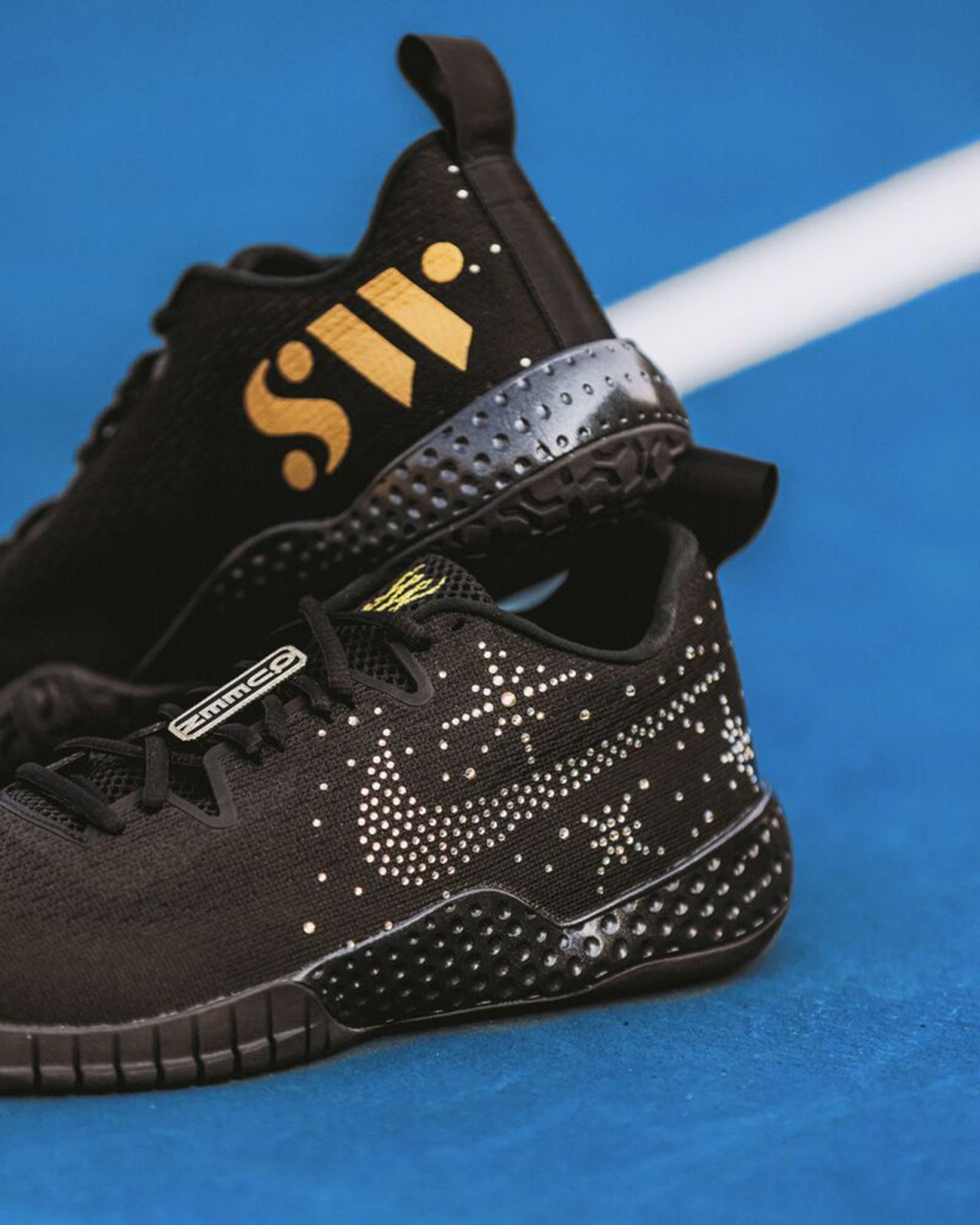 The Nike Swoosh logo on Williams's custom-made sneakers is encrusted with diamonds.
