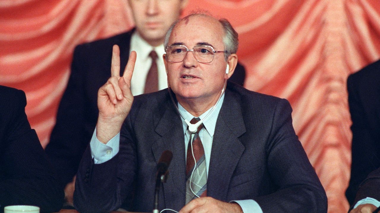 Soviet leader Mikhail Gorbachev gestures during a news conference at the Soviet Compound 10 December 1987 following three days of summit talks with US President Ronald Reagan. (Photo by Don EMMERT / AFP) (Photo by DON EMMERT/AFP via Getty Images)