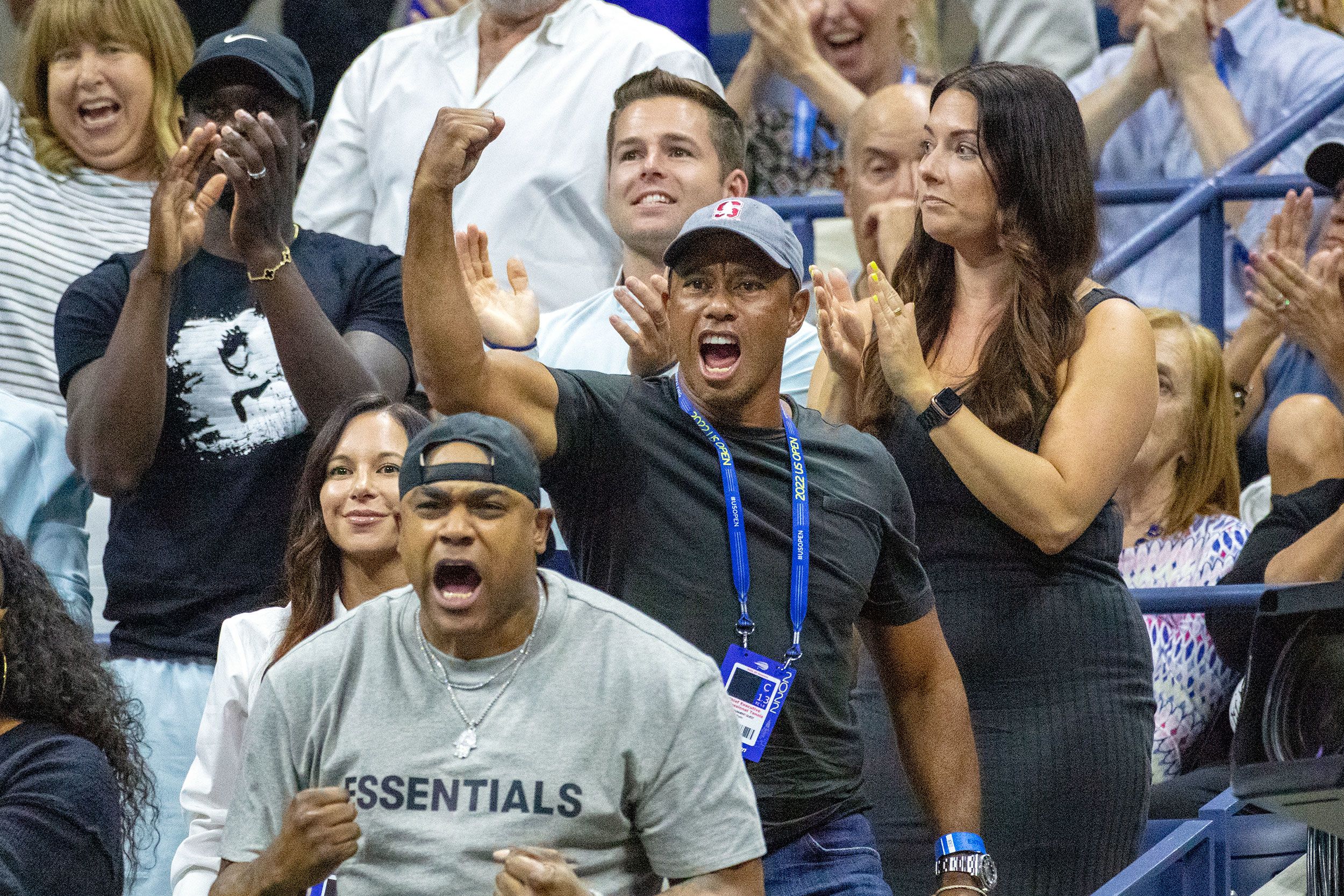 Golf legend Tiger Woods reacts to a Williams point on Wednesday.