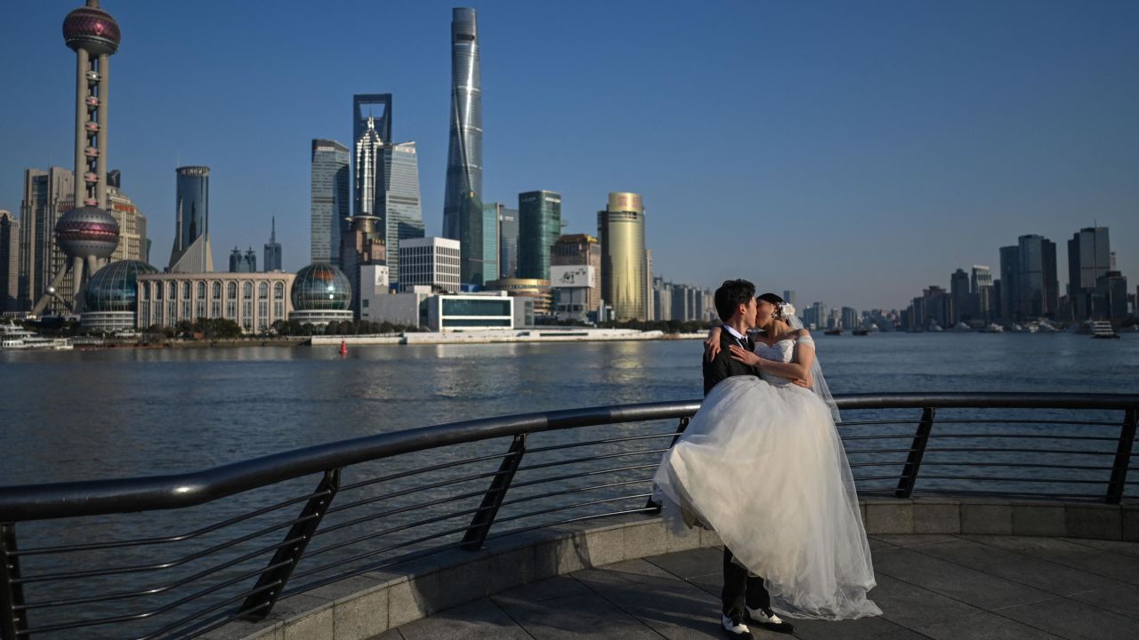 A couple on the promenade of the Huangpu River in Shanghai, China, on February 24.