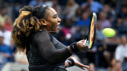  Serena Williams hits a return to  Anett Kontaveit during their US Open Tennis women's singles second round match.